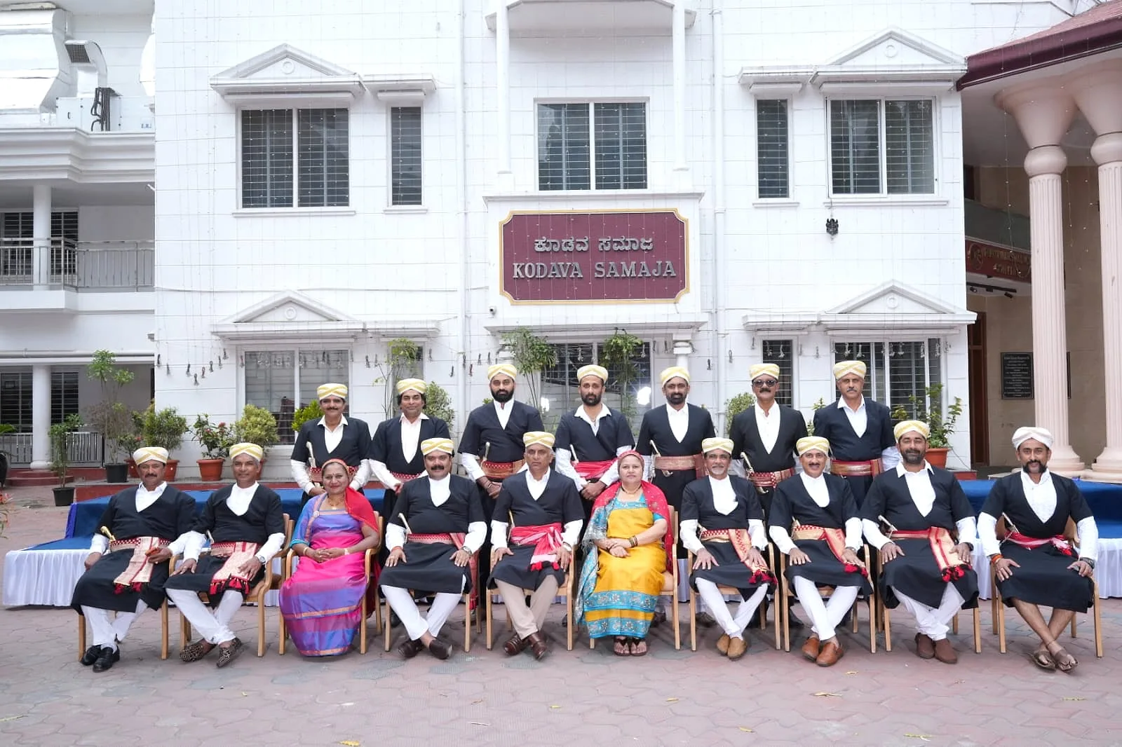 Members of the Kodava Samaja Building Committee, photographed together at the Samaja