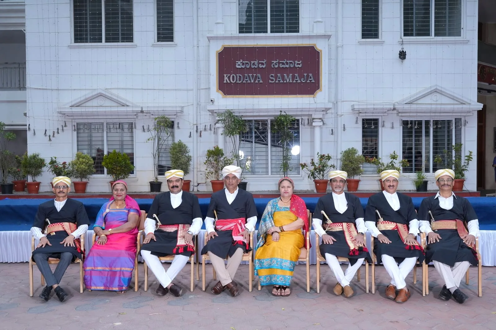 Members of the Kodava Samaja Pombolak Committee, photographed together at the Samaja